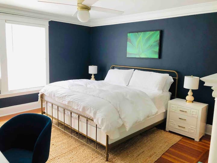 “Blue” king bedroom with green fireplace