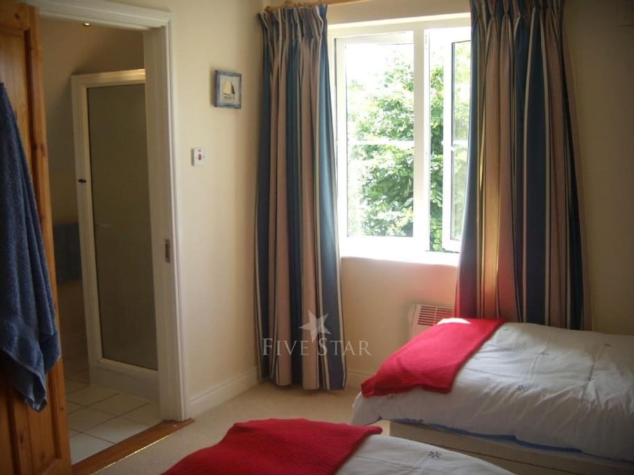 2 Single beds with additional floor matress