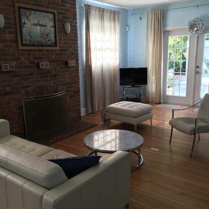 living room and french doors to pool