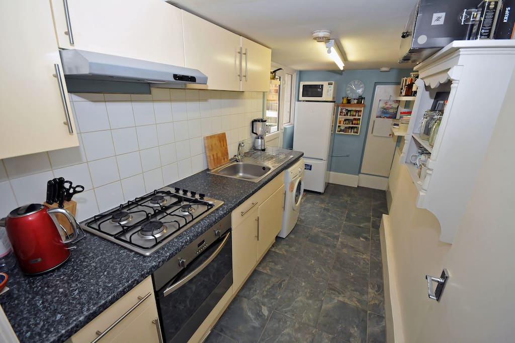 Fully functioning kitchen complete with oven, grill, gas hob, fridge, freezer, microwave, kettle, toaster, washing machine and all utensils needed to cook with.