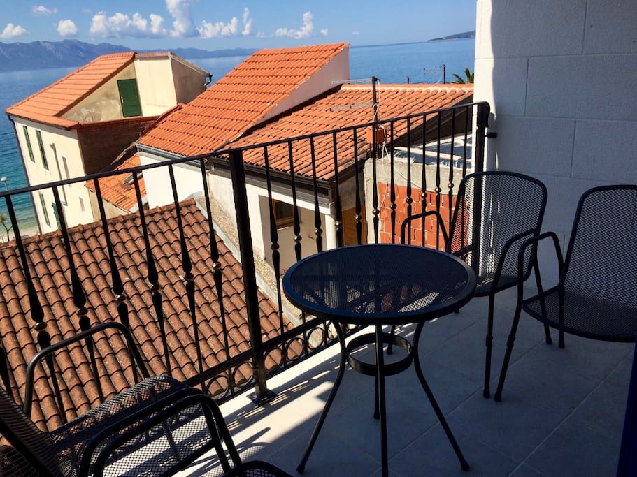 Enjoy breakfast or dinner on the balcony over looking the courtyard