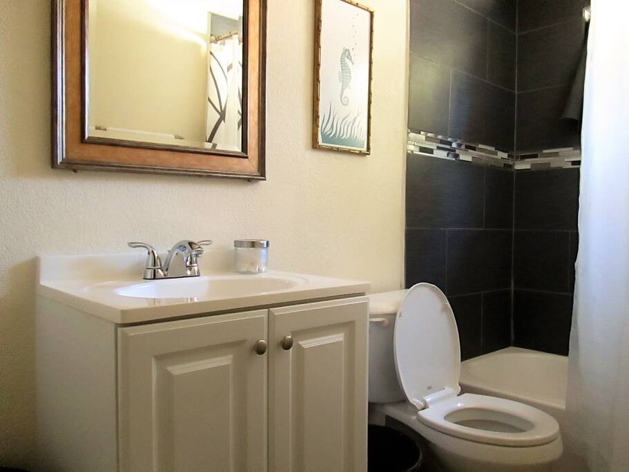 Two clean, stocked bathrooms