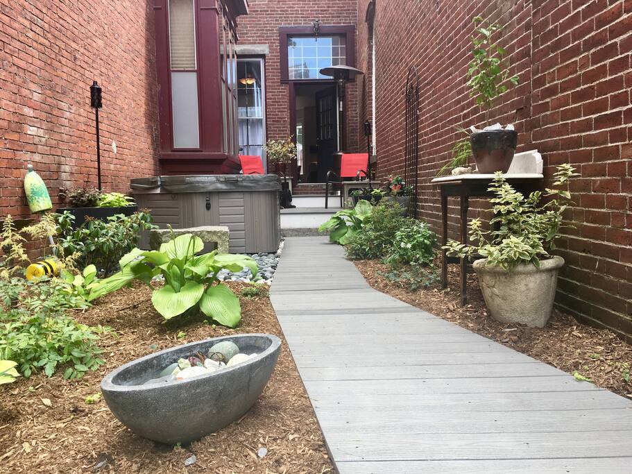 Pretty plantings in private entrance, not to mention the hot tub! (Open year round!)