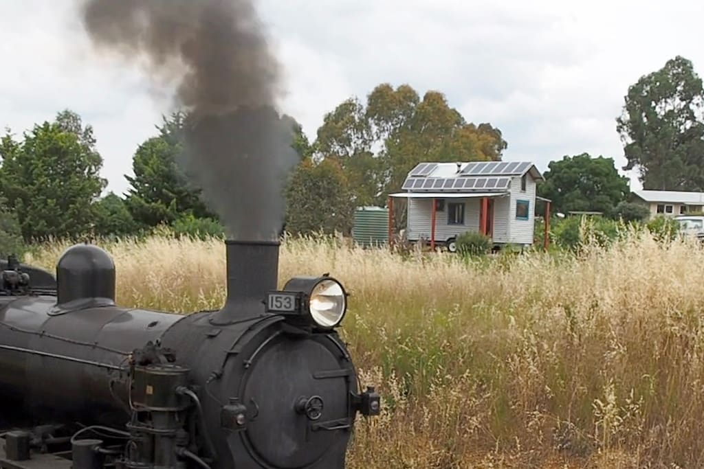 Victorian Goldfields Railway steam engine passes our tiny house.