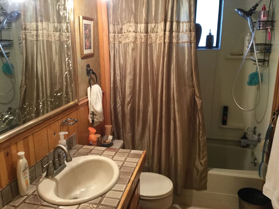 Upstairs bathroom has tub and shower.