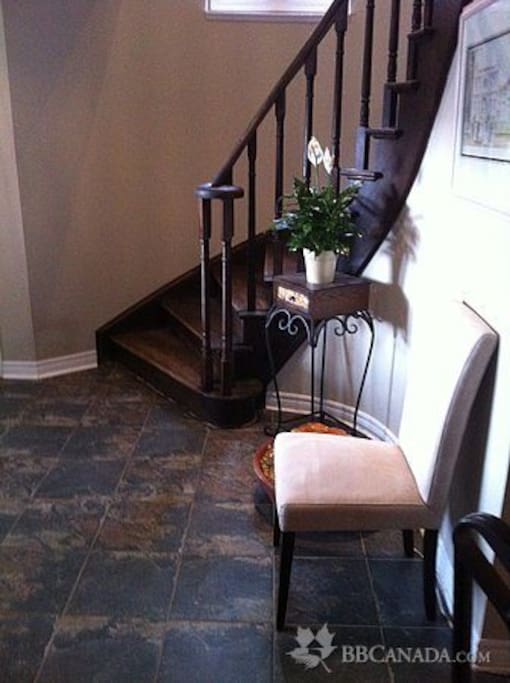 Front Hall and Staircase to Suites