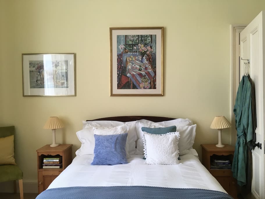 Spacious double bedroom with down-filled pillows and duvet for the perfect night's sleep.