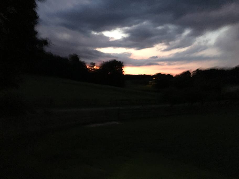View from front porch at sunset, into the blue ridge mountains near Asheville and Hendersonville.