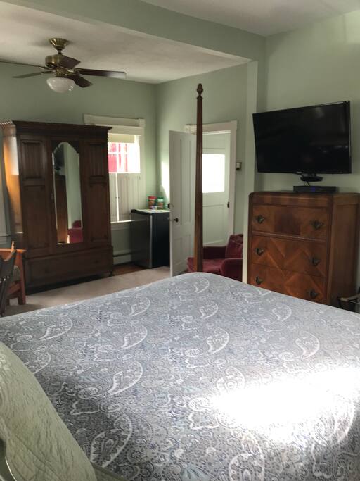 Outside entrance with double locking door and flat screen TV with premium channels