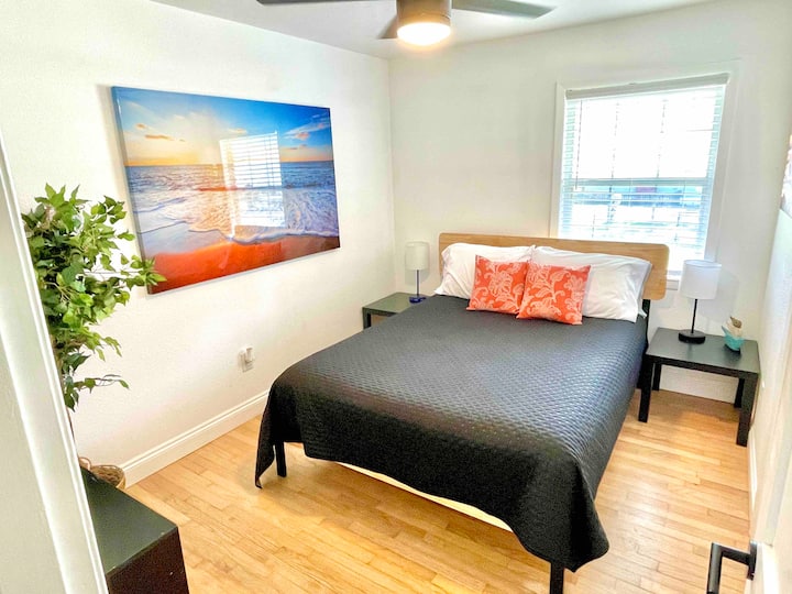 Queen sized bed, ceiling fan, and bedside lamps with built in USB port for your convenience. 