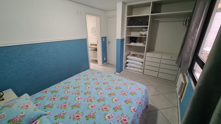 View from the master suite, with air conditioning, double bed, private bathroom, closet with six pillows, three light double blankets, hairdryer and electric iron.