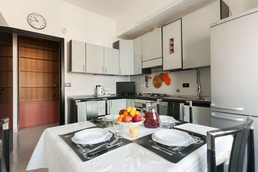 The equipped Kitchen & The dining table