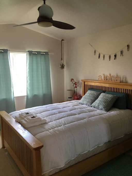 Distressed koa finish ceiling fan helps keep room cool