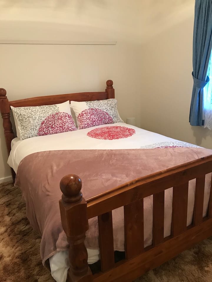 Queen size bed with plush pillow top mattress 