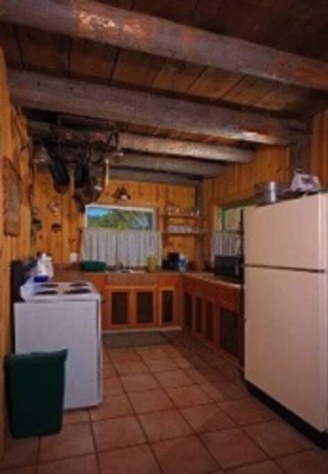 Kitchen with micro wave, dishwasher and stove.