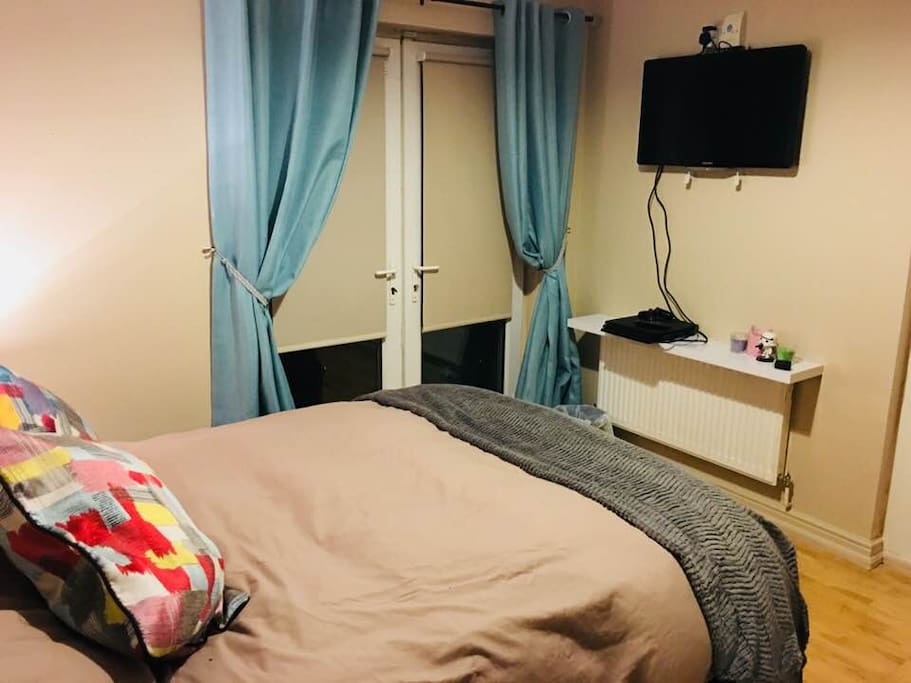 Your cosy bright double bedroom with 32 inch TV