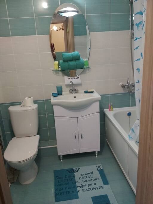 Bathroom with fullsize bath. Soap, shampoo, toilet paper and towels are included.
