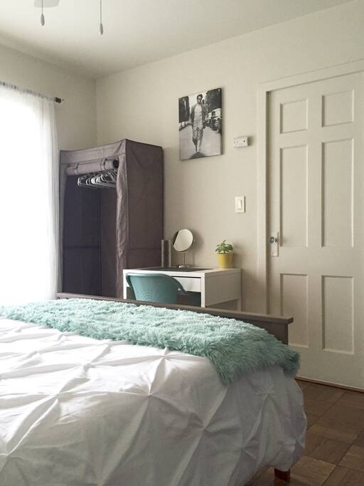 Closet with hangers and steamer.