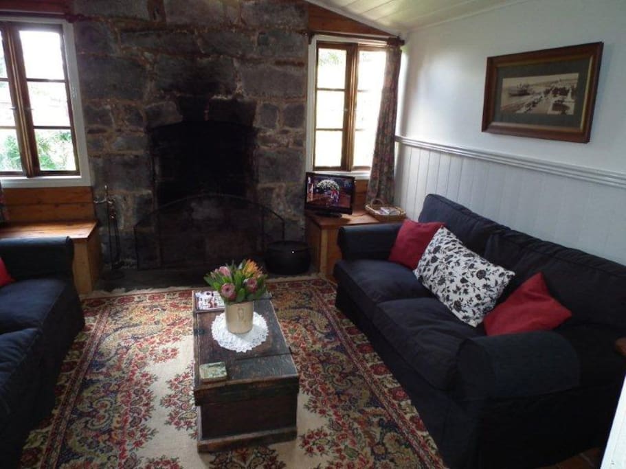 Lounge room with bluestone open fireplace