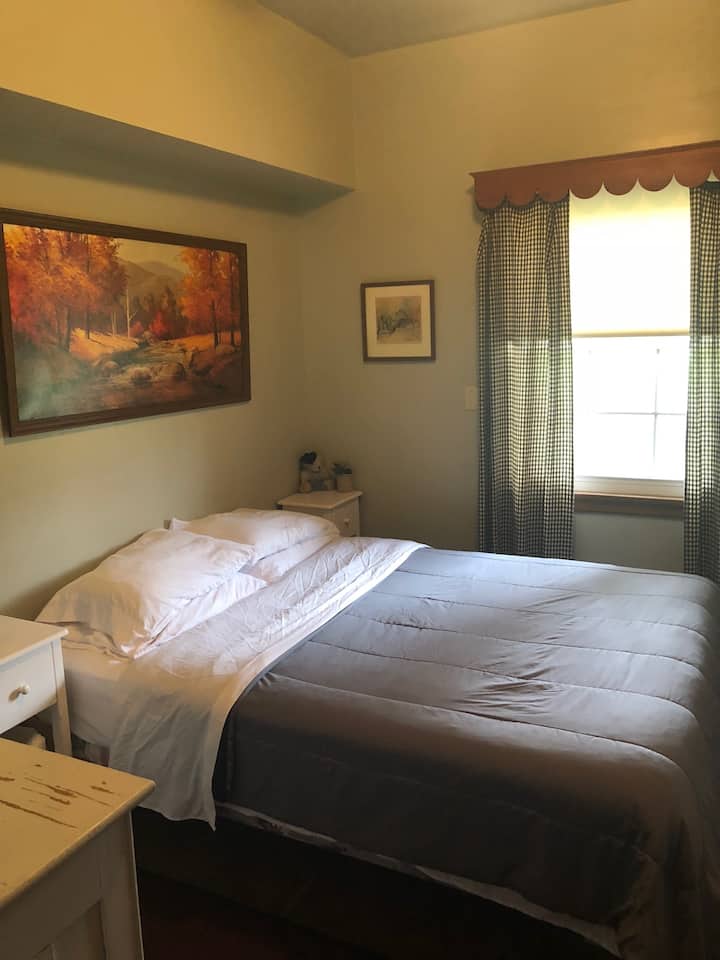 You'll find a single double bed in this pretty room