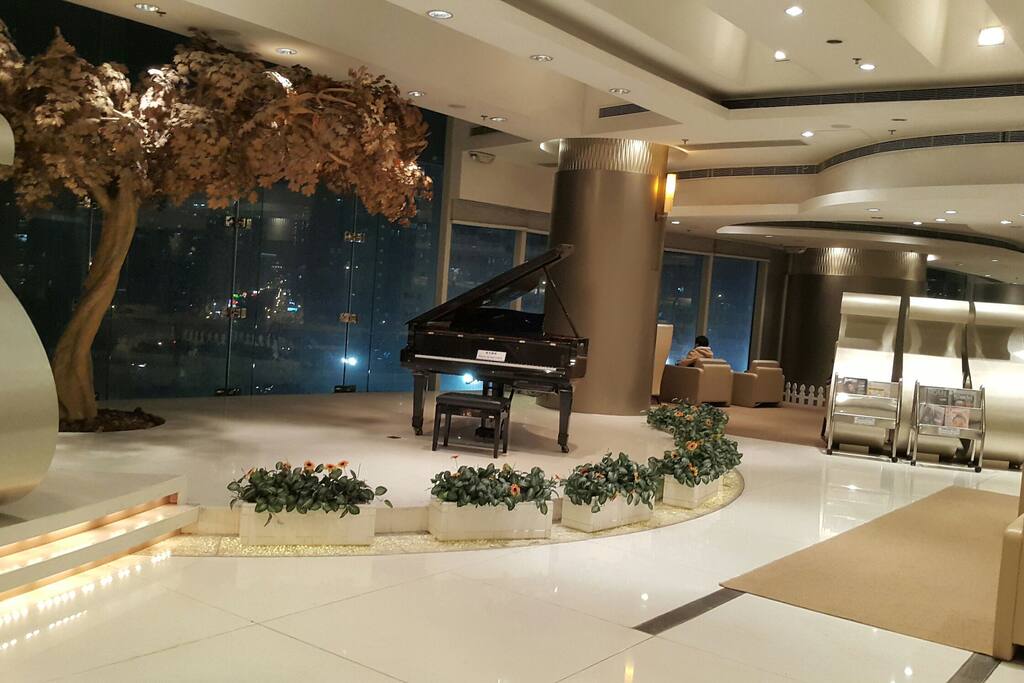 Modern building with Club House and facilities (gym, outdoor swimming pool, bowling lanes, virtual golf, billiard pool, rock climbing, air hockey, massage chairs, etc, between 5-15 HKD each service), and private garden for residents.