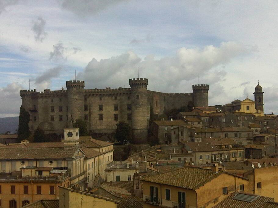 The apartment is at the base of the church belltower