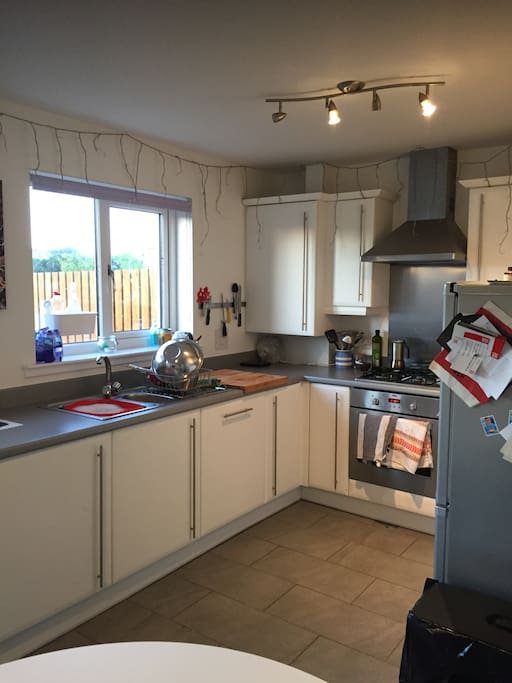 Kitchen, electric cooker and gas hob