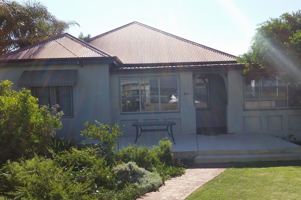Stockton Beach House - 175m to beach. Front Porch - lovely place to relax and look across to the surf and Stockton Beach