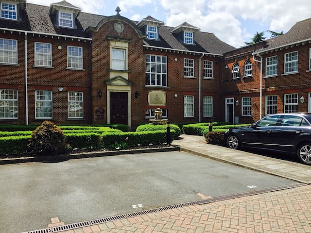 Cosy small double room. Free visitor car parking.
