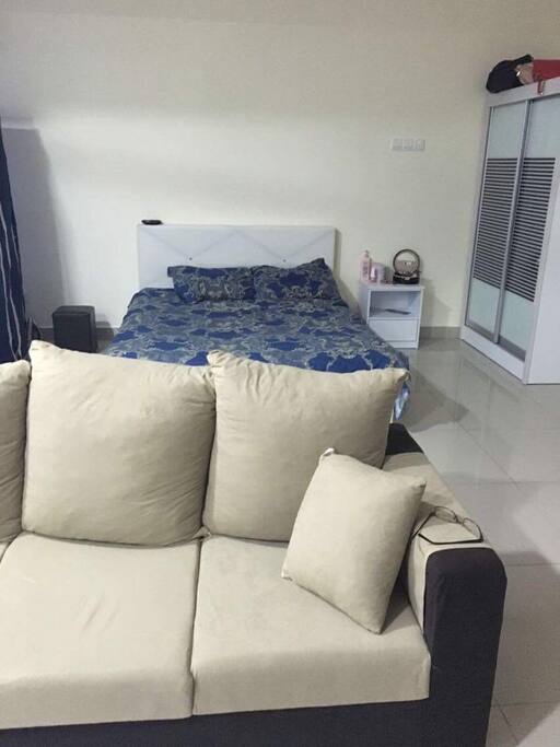 Comfortable bed with smooth couch
