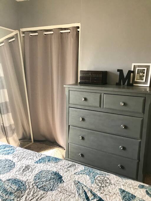Master bedroom comes with closet and dresser drawer space.