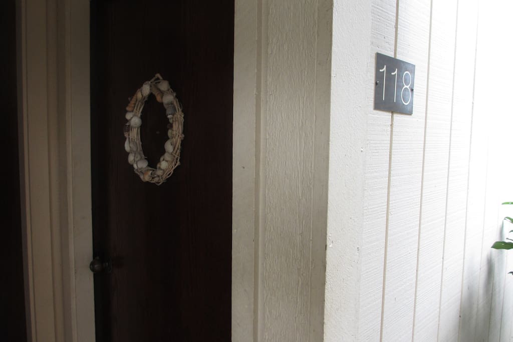 Aloha, You found your own private studio. 118B,a shell wreath on your door