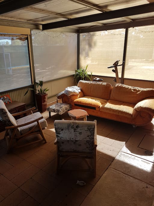 Outdoor, undercover seating area