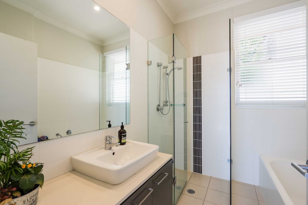 Bathroom complete with bath and lockable door.