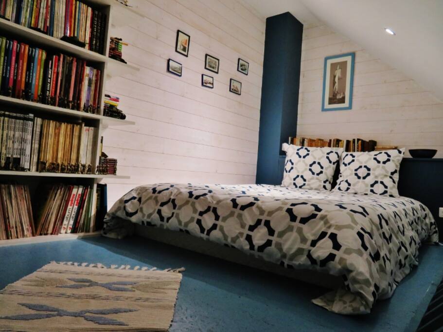 Couchage double en mezzanine avec échelle de meunier