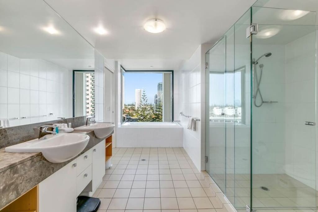 Spacious bathroom with his and hers vanity