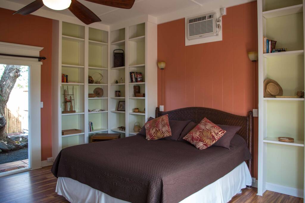 The built in shelving and high ceilings are all part of the original design.