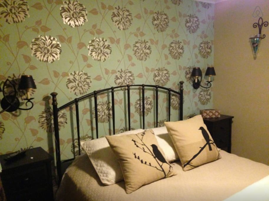 Master Suite with dresser and Private entry to main floor bathroom.