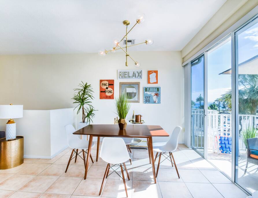 Comfortable, stylish and modern dining room to enjoy a delicious meal while taking a break from the sunny beach!