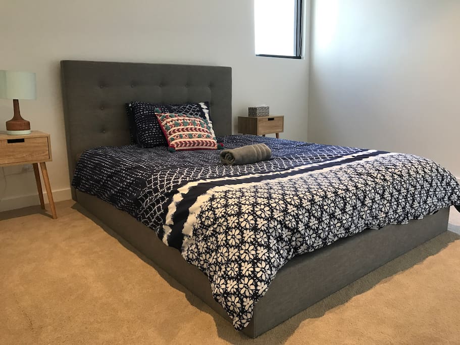 Generally sized bedroom with brand new furnitures and accessories.