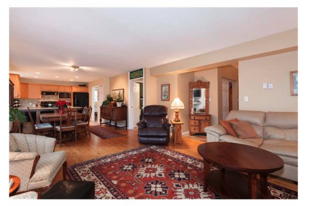 The open concept kitchen- dining-living room is ideal for coming together