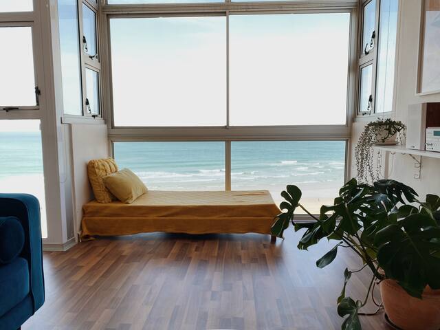 cute, sun-soaked apartment above the sea gallery image 3