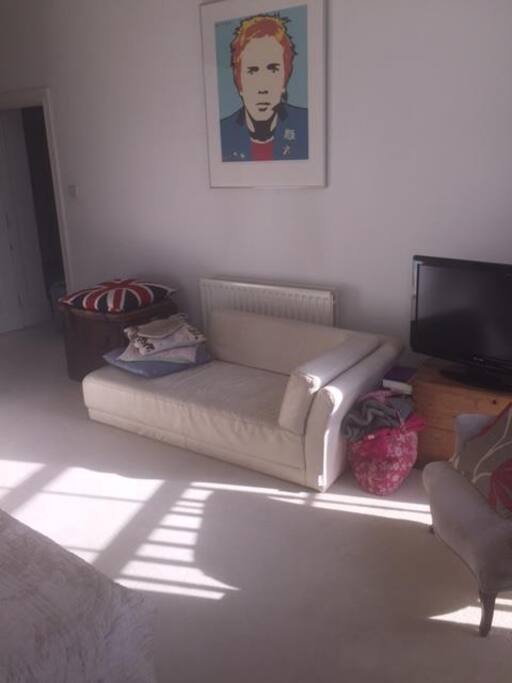 TV and Sofa in bedroom