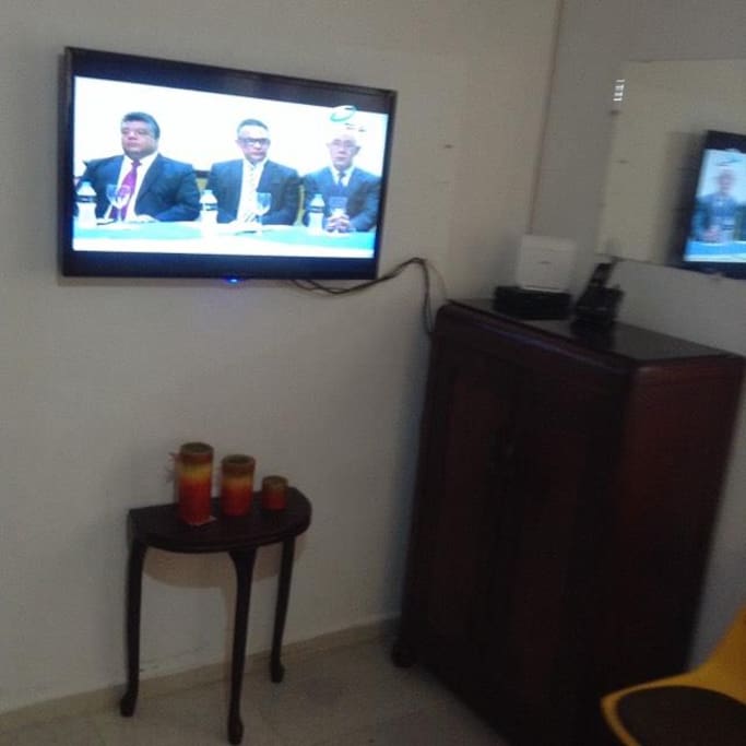 TV and Cabinet in Bedroom