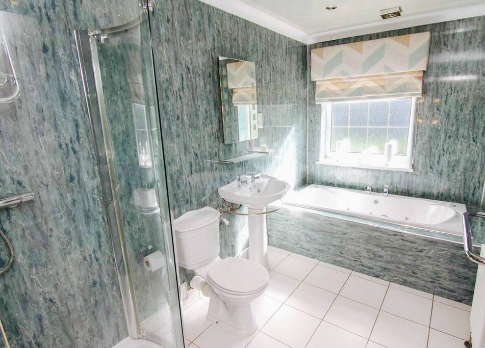 Relax in our Jacuzzi bath