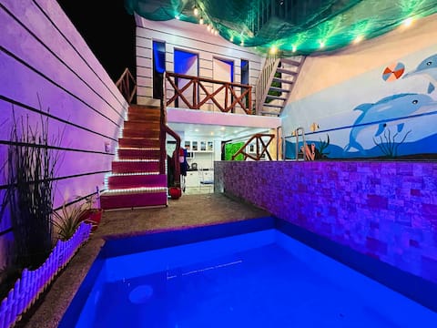 affordable 2 bedroom rest house w/ pools & parking