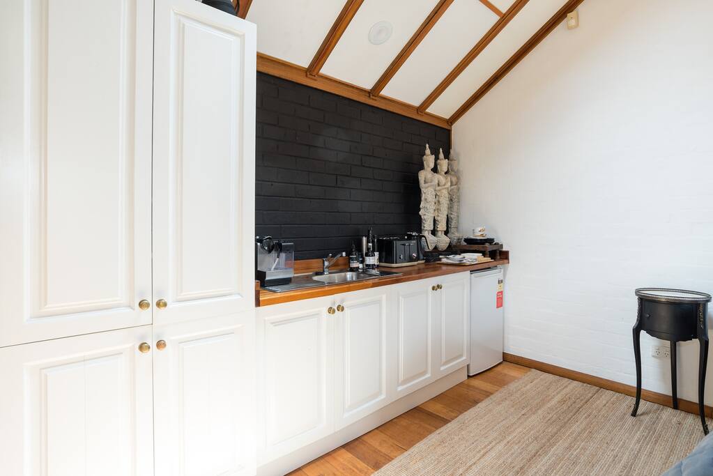 The small kitchenette has everything you need from microwave to a Nespresso coffee machine