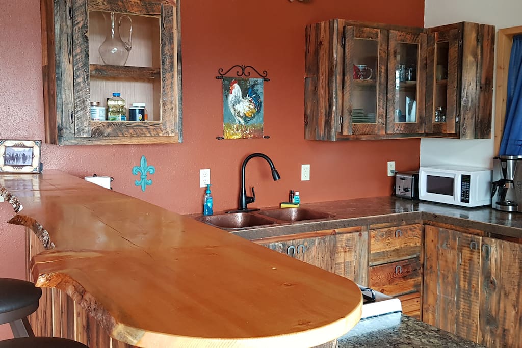 Kitchen with barnwood cupboards