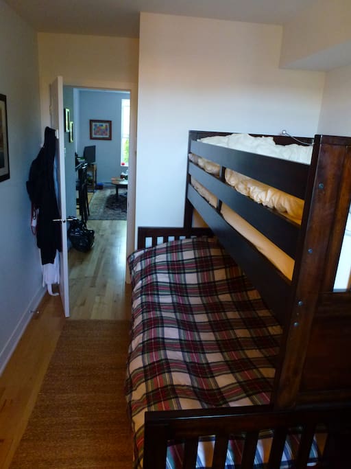 Second bedroom, bright, with bunk beds.