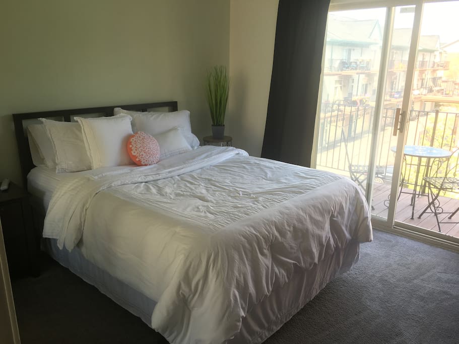 Comfortable queen sized bed. Bedroom gets plenty of natural light.